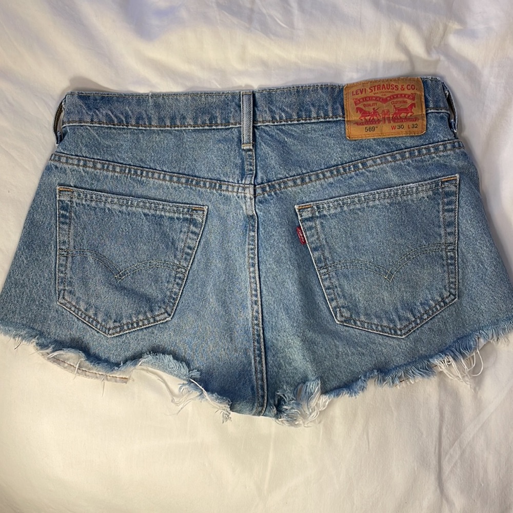 Levi’s Distressed High Rise Shorties - Picture 2 of 3